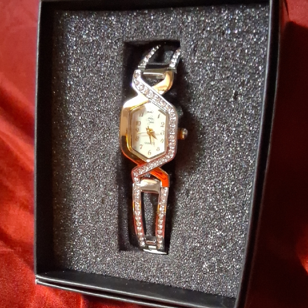 Silver and Gold Analog Watches with Metallic Tones